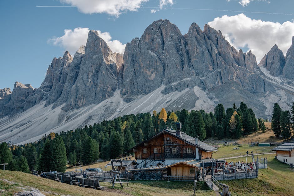 Stunning landscape of Dolomites with an alpine lodge, capturing the essence of nature's beauty and tranquility.